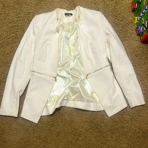 Cream/white blazer with gold zipper accents. Wore once.